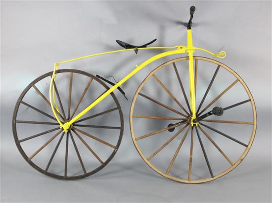 A wrought iron and ash model of a Michaux Velocipede bicycle, c.1865, H.4ft 3in. L.6ft 2in.